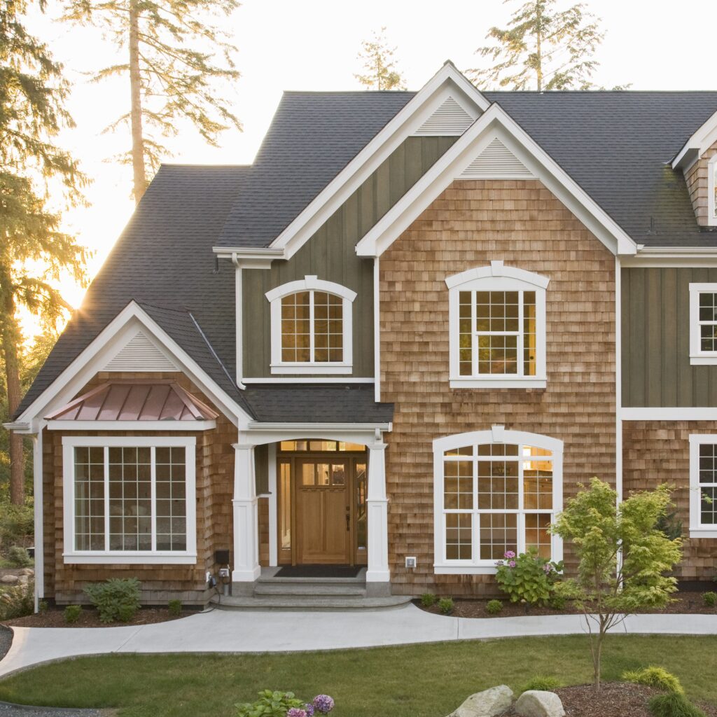 Brown house with blue shingles
